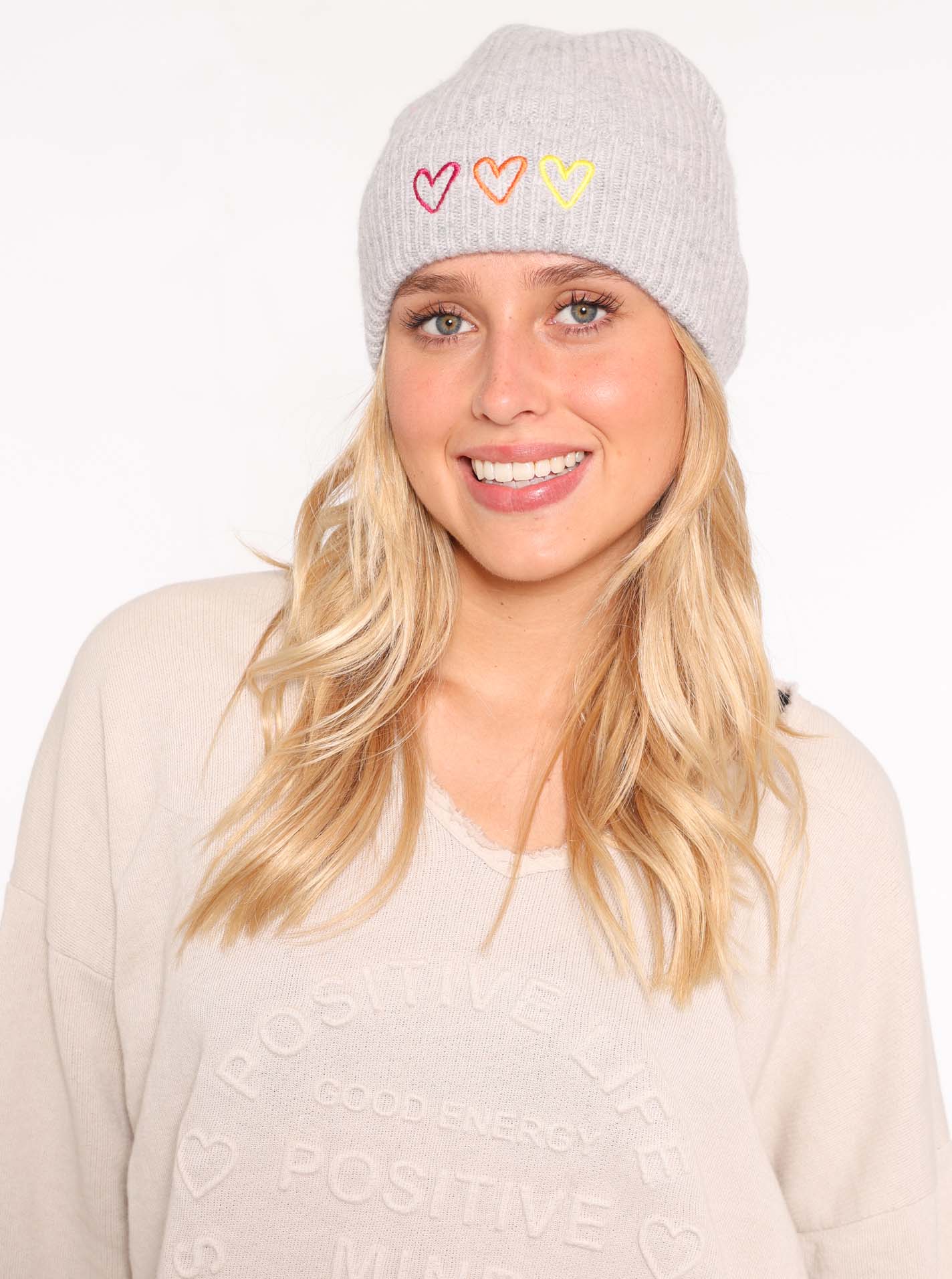 100% Cashmere Umschlagmütze "Herzstickerei"